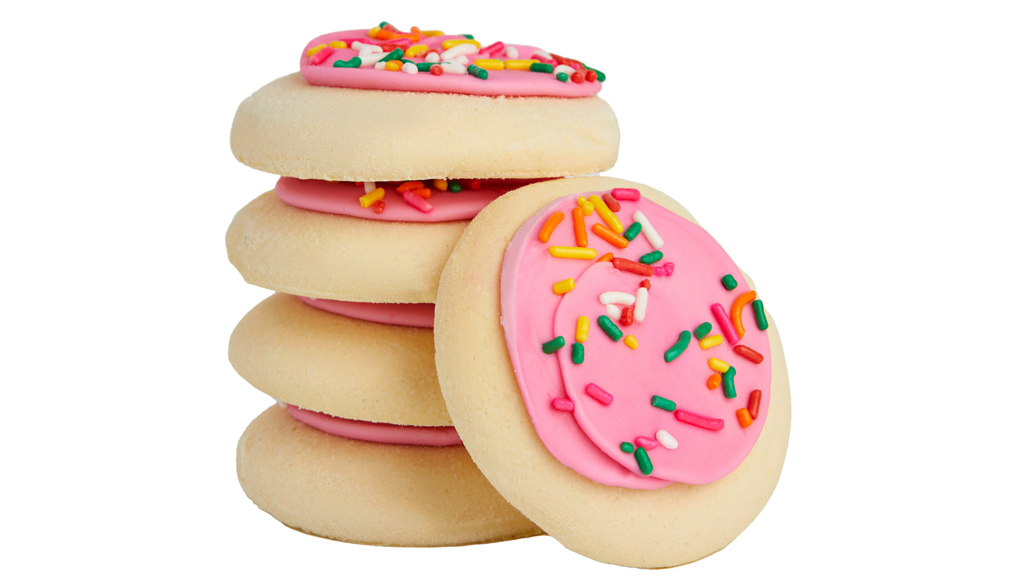 A stack of five sugar cookies topped with pink frosting and colorful sprinkles, with one cookie leaning against the stack, all on a white background.